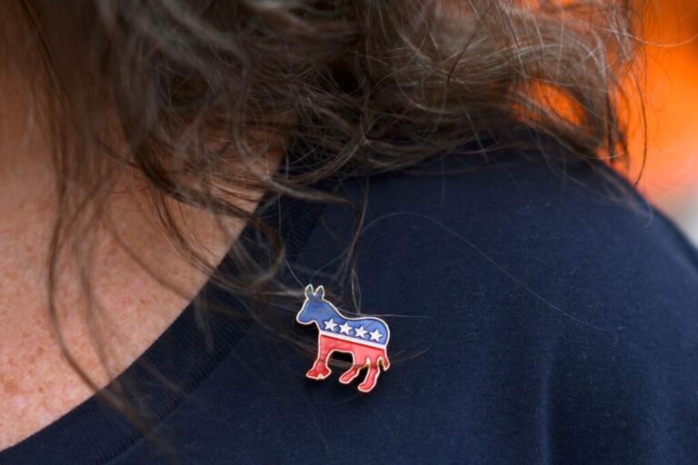 A person wears a Democrat donkey pin on September 21, 2018, in Philadelphia, Pennsylvania.