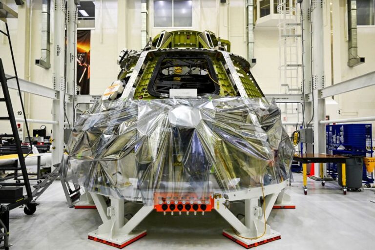 The Artemis III crew module is seen inside the Neil Armstrong Operations and Checkout Building at the Kennedy Space Center in Florida.