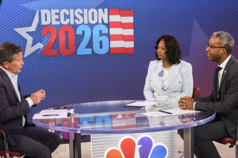 Janeese Lewis-George and Kenyan McDuffie have an exchange during a mayoral debate on June 4, at NBC4 News in Washington, DC.