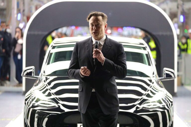 Elon Musk speaks during the official opening of the Tesla electric car manufacturing plant near Gruenheide, Germany, in March 2022.