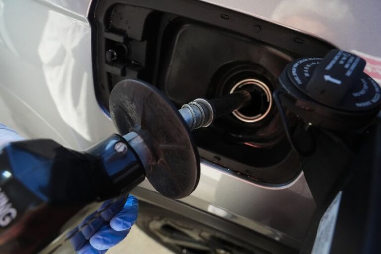 A motorist fills up at a gas station in Buffalo Grove, Illinois, on June 8, 2026.