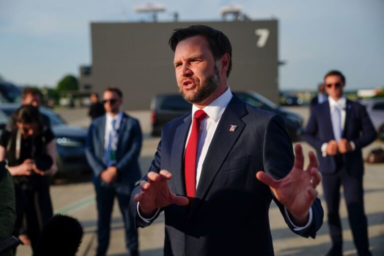 Vice President JD Vance speaks to the media before boarding Air Force Two, at Emmen Military Air Base in Emmen, Switzerland, on Monday.
