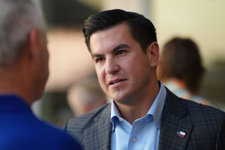 Eric Flores visits with supporters during a campaign stop in Corpus Christi, Texas, in February.
