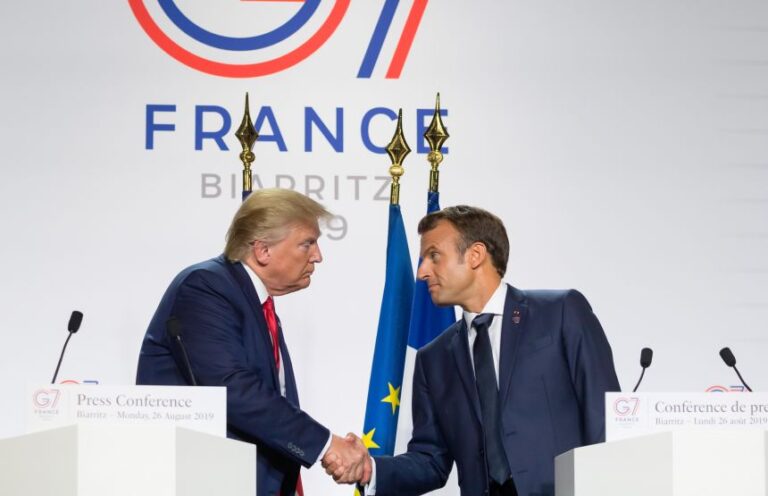 President Donald Trump and French President Emmanuel Macron shake hands during a joint press conference in Biarritz, France, on August 28, 2019.