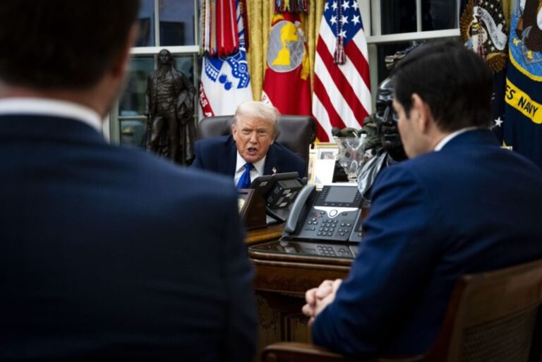 President Donald Trump gives an interview, attended by Vice President JD Vance, left, and Secretary of State Marco Rubio, right, in the Oval Office of the White House in January.
