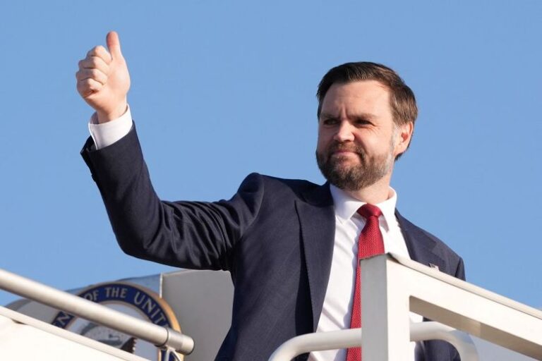 U.S. Vice President JD Vance gestures as he boards Air Force Two, after peace talks with Iran in Islamabad, Pakistan, Sunday, April 12, 2026.
