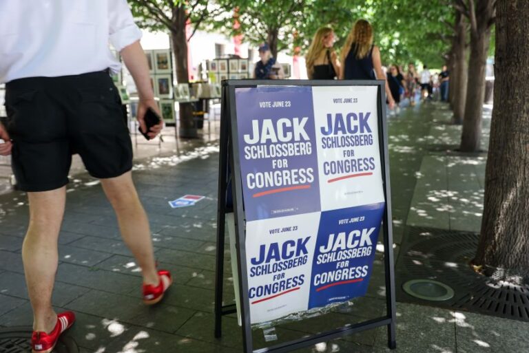 Campaign signage for Jack Schlossberg, US congressional candidate, outside a polling location at the Metropolitan Museum of Art on the first day of early voting for a primary election in New York, on June 13.