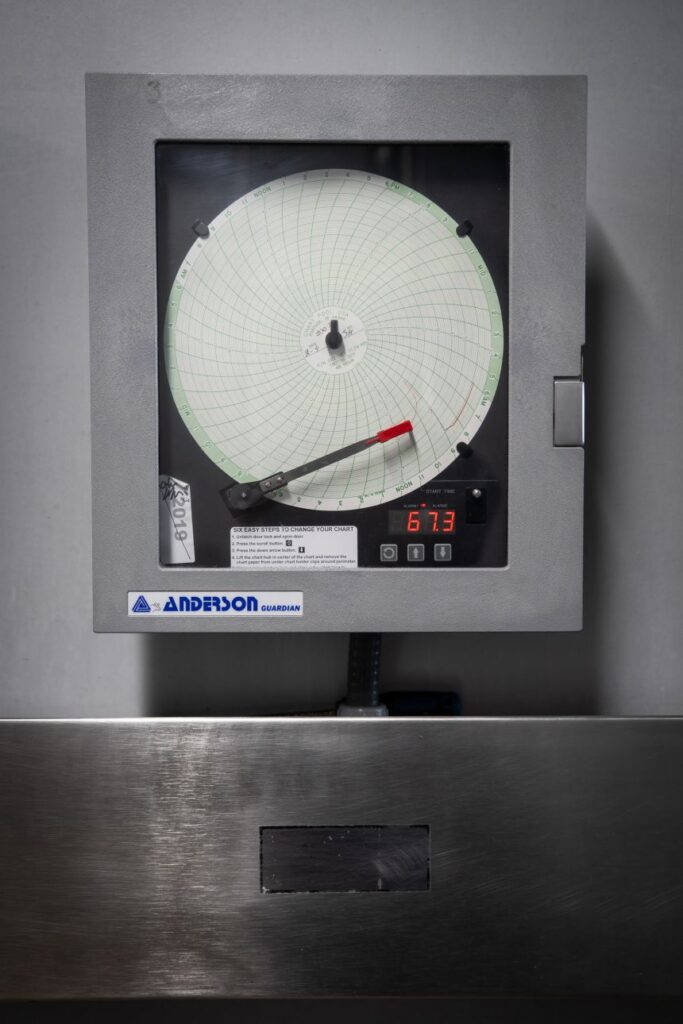 Machinery is used to process milk during the start of testing production at Raw Farm.
