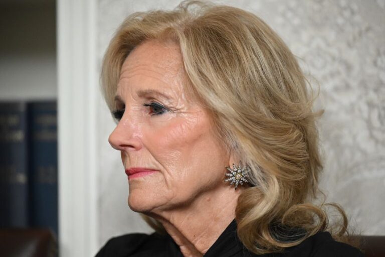 First lady Jill Biden listens to President Joe Biden as he delivers his farewell address to the nation, from the Oval Office of the White House on January 15, 2025.