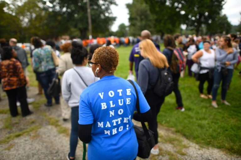 Gloria Thomas wears a t-shirt stating