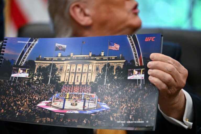US President Donald Trump shows a rendering of the upcoming