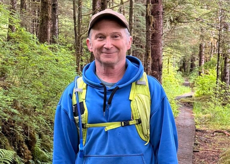 In this image provided by Karen Dillman, Alaska Senate candidate Dan Sullivan, one of the challengers to the incumbent senator, also named Dan Sullivan, poses on a hike, June 7, 2026, on Kupreanof Island, near Petersburg, Alaska.