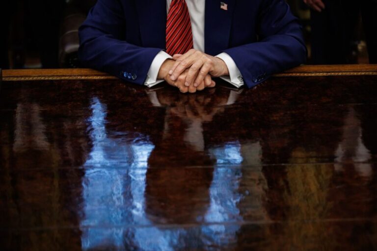 President Donald Trump speaks to members of the media after signing executive orders in the Oval Office of the White House, in May 2025.
