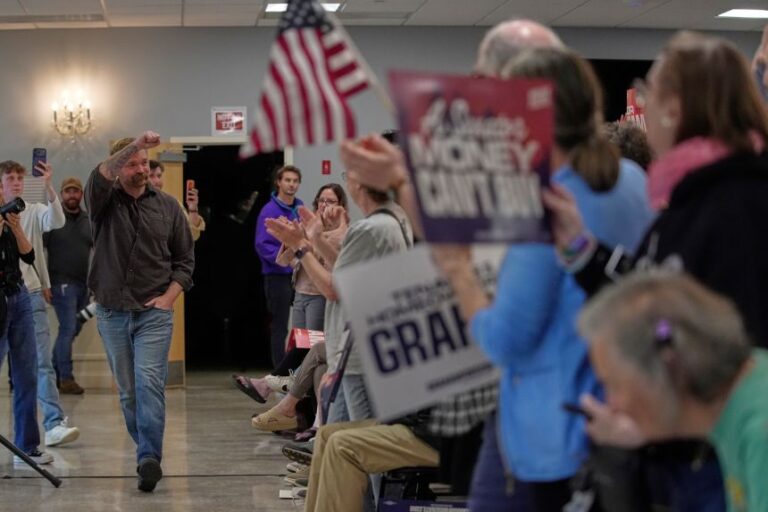 Graham Platner, Democratic candidate for US Senate, acknowledges applause at a campaign event Sunday, in Portland, Maine.