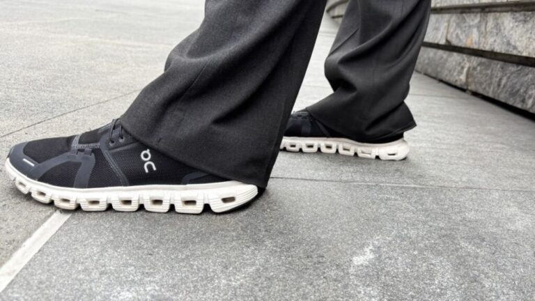 A woman wearing On Cloud 6 walking shoes.