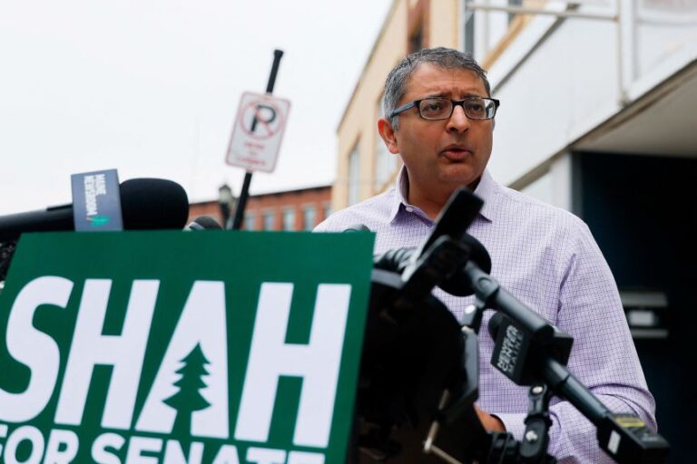 Nirav Shah, Democratic candidate for US Senate, speaks at a press conference outside the office of Sen. Susan Collins, in Biddeford, Maine, on Tuesday.