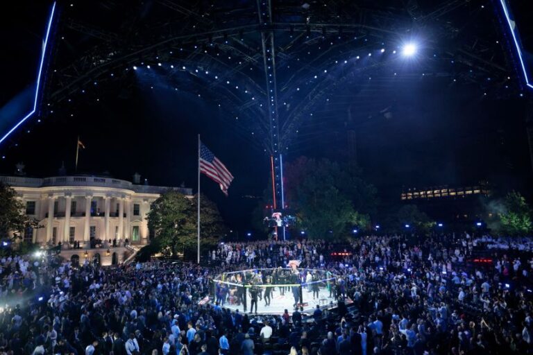 America's Justin Gaethje celebrates after defeating Georgia's Ilia Topuria during
