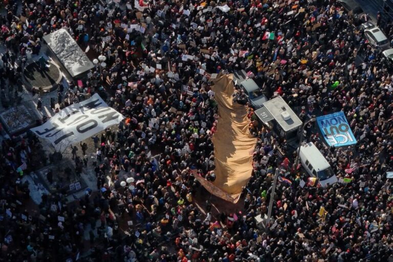 Demonstrators take part in an