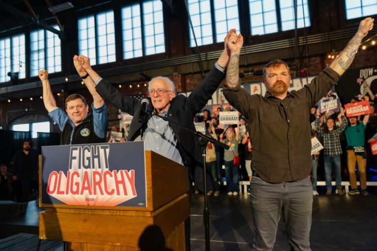 Troy Jackson, Sen. Bernie Sanders, and Graham Platner during a Fighting Oligarchy event in Portland, Maine, on May 25, 2026.