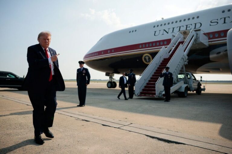 President Donald Trump points toward the new Air Force One, a plane gifted by the Qatari government, at Joint Base Andrews, Maryland, on July 1.