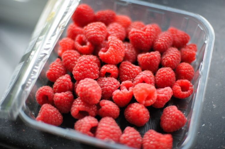 In a study, diligent washing removed most, but not all, of the cyclospora eggs on raspberries.