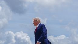 President Donald Trump walks to the presidential limousineafter arriving on Air Force One at Dobbins Air Reserve Base, July 22, in Marietta, Georgia.