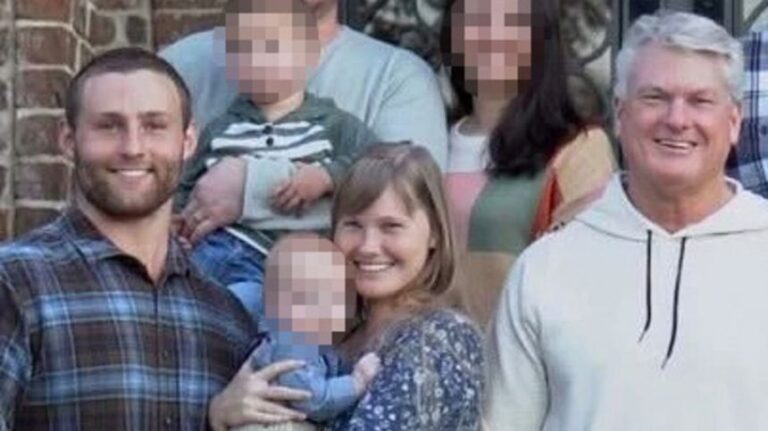 David Alan Scheer II and Rep. Mike Collins are seen in this image from Collins’ Senate campaign website. CNN has cropped and blurred portions of the image to protect the identities of others in the photograph.