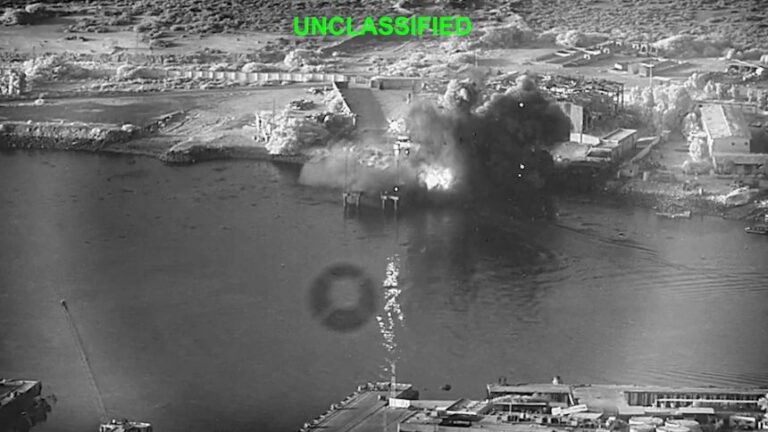 This image from video released by US Central Command shows an explosion caused by US military one-way attack drones at Bandar Abbas Naval Base, Iran, on July 12, 2026.