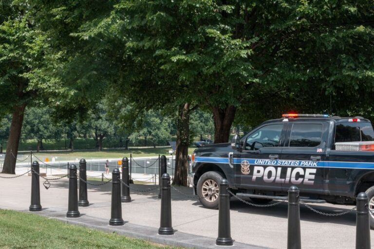 A US Park Police officer stands watch over the Lincoln Memorial Reflecting Pool in Washington, DC, on June 26.