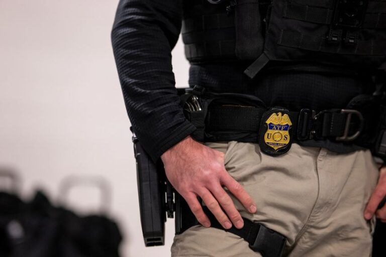 A Bureau of Alcohol, Tobacco, Firearms and Explosives agent attends a meeting with other federal law enforcement agencies, related to immigration enforcement, in Chicago on January 26, 2025.