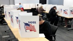 TOPSHOT - People cast their ballots on the last day of early voting for the general election in Michigan at the Livingston Educational Service Agency in Howell, Michigan on November 3, 2024. (Photo by JEFF KOWALSKY / AFP) (Photo by JEFF KOWALSKY/AFP via Getty Images)