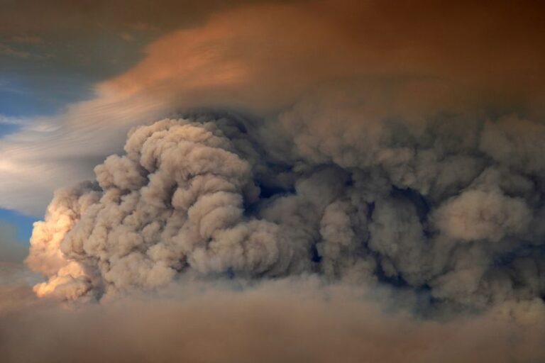 Plumes of smoke from the Camp Fire hang in the air over Moose Lake in Minnesota's Boundary Waters Canoe Area Wilderness on Tuesday, July 14.