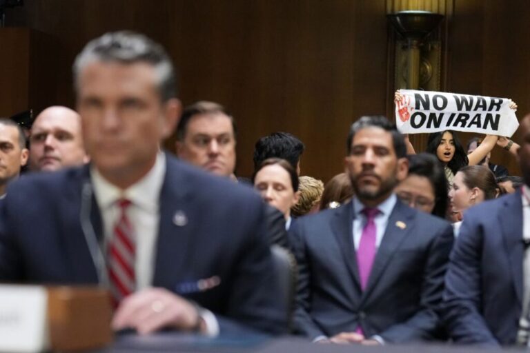 A protester interrupts Defense Secretary Pete Hegseth as he testifies at a hearing of the Senate Appropriations Committee, on July 21.