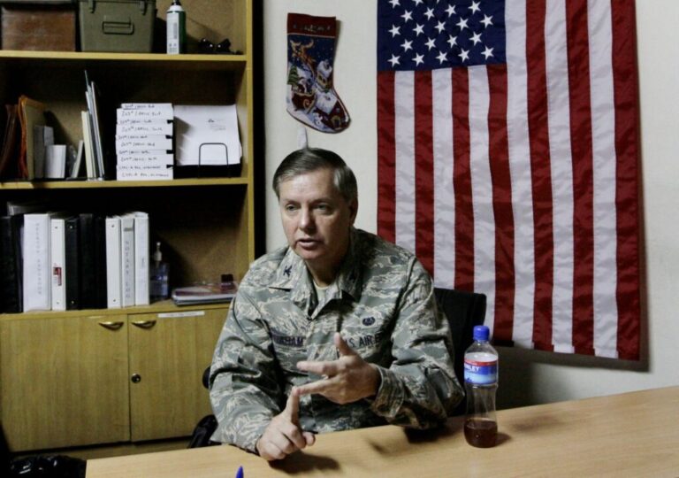 Lindsey Graham gestures during an interview at a U.S. base in Kabul, Afghanistan, on December 10, 2008.