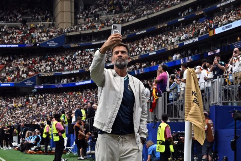 Former Liverpool head coach Jürgen Klopp takes a selfie on the sideline at the end of the 2026 World Cup Group E football match between Germany and Curacao at the Houston Stadium in Texas on June 14, 2026.