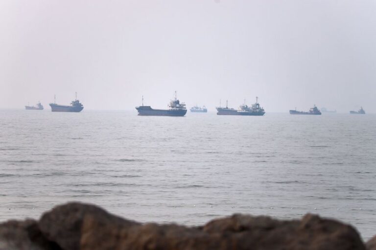 Commercial vessels are seen in the Strait of Hormuz off Bandar Abbas, Iran, on June 30.