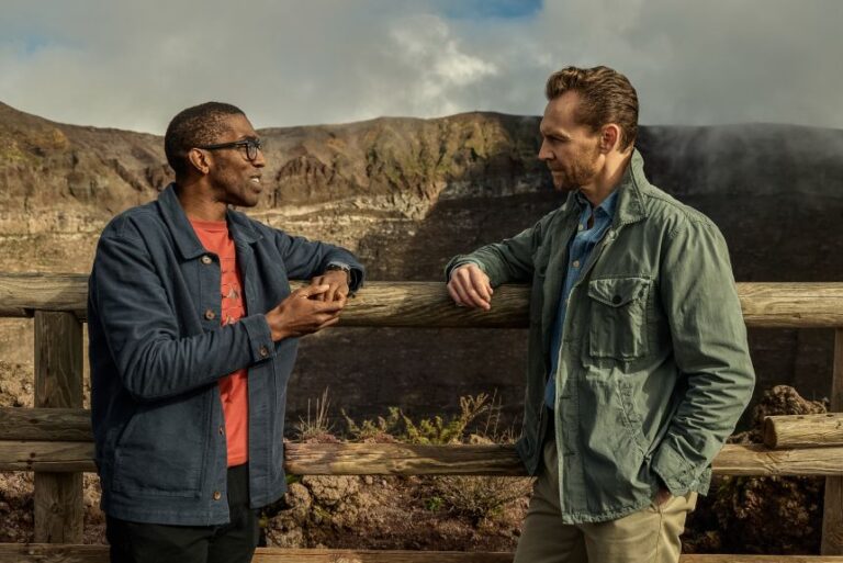 Christopher Jackson (left), visiting professor at Imperial College London, and Tom Hiddleston discuss the eruption from atop Mount Vesuvius.
