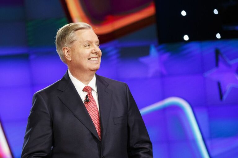 Sen. Lindsey Graham stands on stage at the start of a Republican presidential primary debate in Las Vegas, in December 2015.