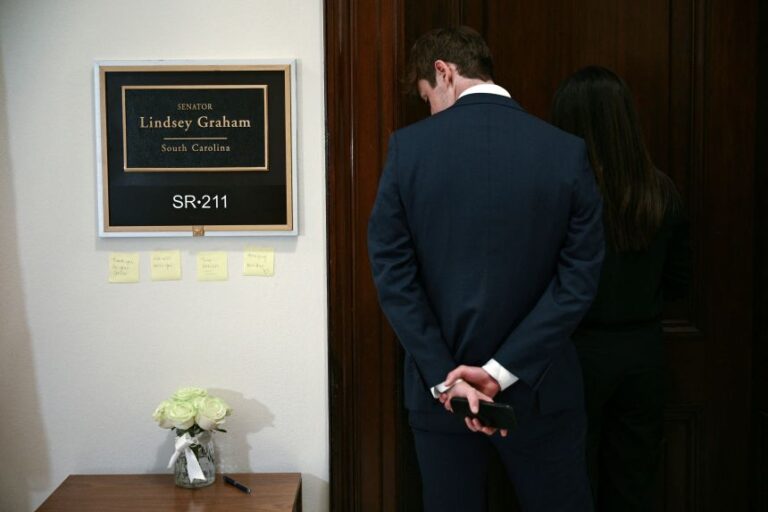 Flowers are left outside the office of the late US Senator Lindsey Graham on Capitol Hill in Washington, DC, on July 13.