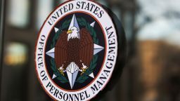 A view shows the logo of the Office of Personnel Management (OPM), after probationary staff at the OPM were fired in a conference call and given less than an hour to leave the building, outside OPM in Washington, D.C., U.S., February 13, 2025. REUTERS/Tierney L. Cross