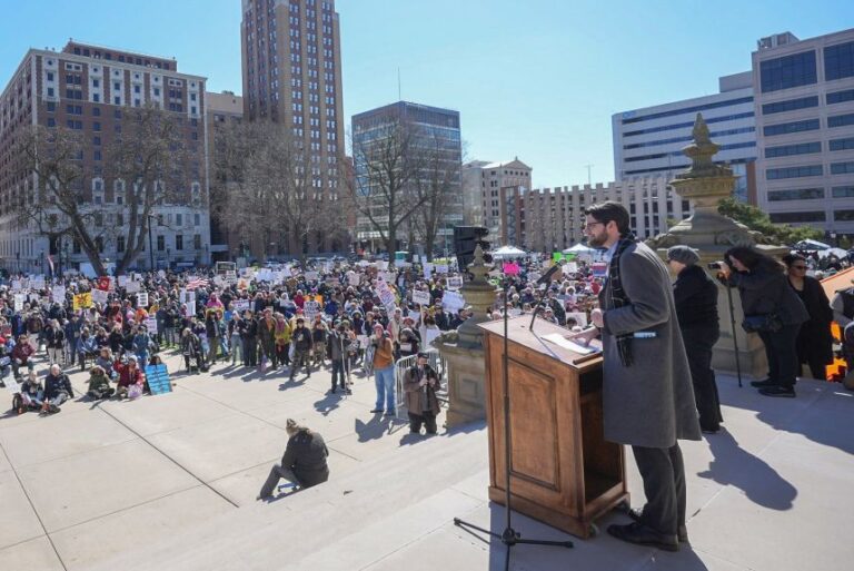 Democratic congressional candidate William Lawrence speaks to the crowd at a
