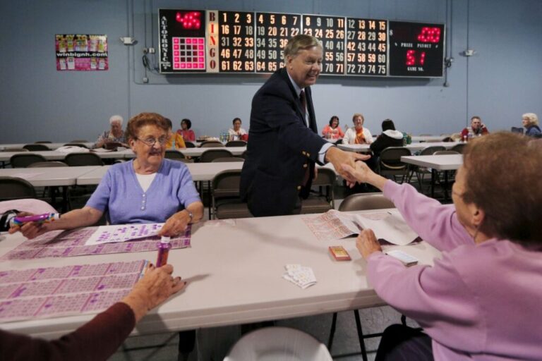 Lindsey Graham greets Bingo players at the Manchester Bingo Center and Poker Room in Manchester, New Hampshire, on October 9, 2015.