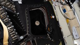 art002e009210 (April 6, 2026) - Before going to sleep on flight day 5, the Artemis II crew snapped one more photo of the Moon, as it drew close in the window of the Orion spacecraft. Orion and the four humans aboard entered the lunar sphere of influence at 12:37 a.m. EDT on April 6, at the tail end of the fifth day of their mission. That marked the point at which the Moon's gravity had a stronger pull on the spacecraft than the Earth's. Artemis II's closet approach to the Moon will come on flight day 6, as they swing around the far side before beginning their journey back to Earth. About an hour after entering the lunar sphere of influence, Artemis II Mission Specialist Christina Koch said,