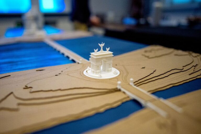 A model of President Donald Trump's proposed arch to commemorate the country's 250th anniversary is seen on a table at a public meeting of the Commission of Fine Arts on April 16, 2026 in Washington, DC.