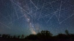 This composite image of exposures taken over 30 minutes on an early June night shows a satellite-filled sky.