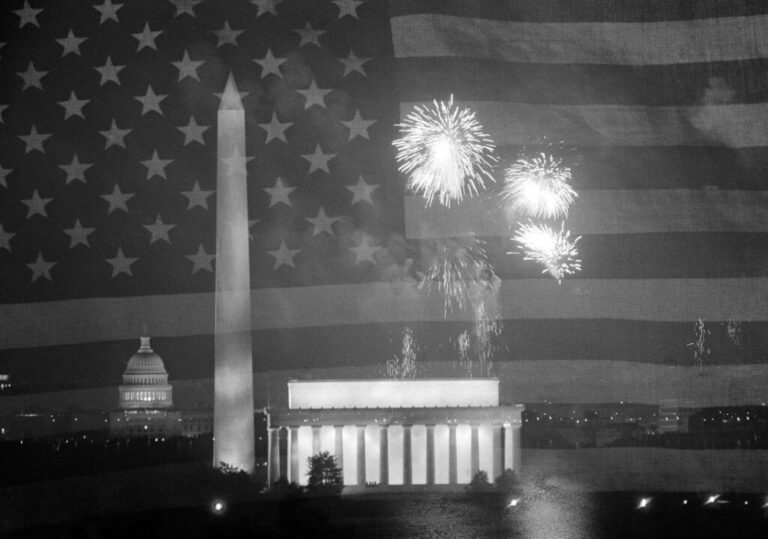Old Glory frames the US Capitol, the Washington Monument, and the Lincoln Memorial as fireworks burst overhead during the finale of the celebration in Washington, on Sunday, July 4, 1976.