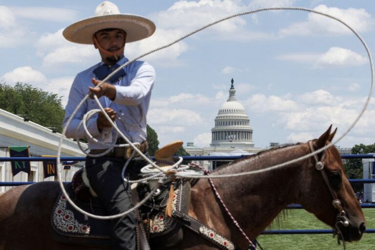 Gabriel Hernandez lassos a rope during a rodeo exhibition at the Great American State Fair on Thursday, June 25.