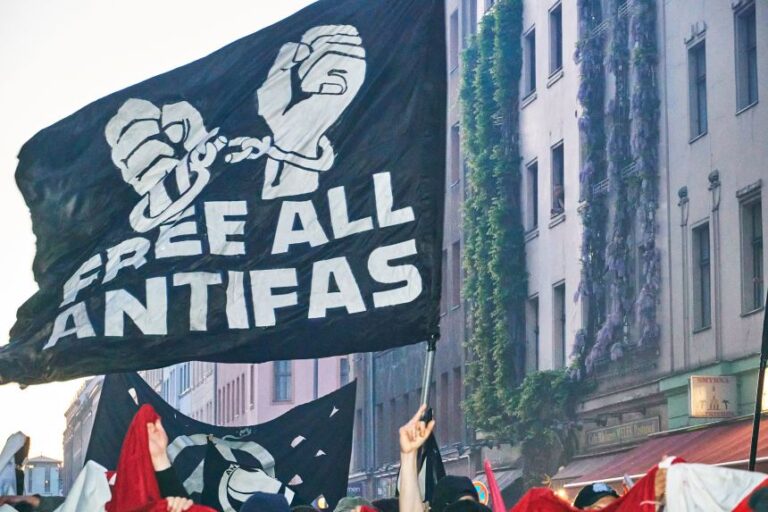 A banner reading ''Free All Antifas'' is displayed at the traditional ''Revolutionarer 1. Mai'' May Day protest in Berlin, Germany, on May 1.