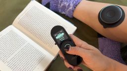 A person using the Chirp Halo while reading.