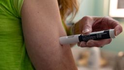 Rebekah Carl injects herself with her weekly dose of Wegovy in New Columbia, Pennsylvania, U.S., November 13, 2023. REUTERS/Hannah Beier